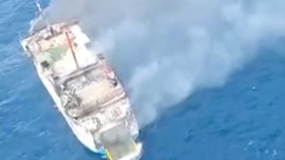 Indonesian ferry catches fire with 130 people on board