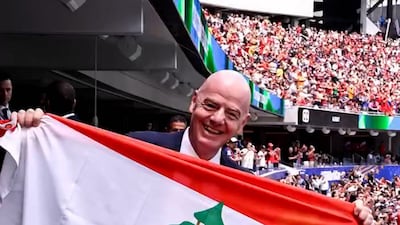 Fifa president Infantino raises Lebanese flag at World Cup