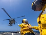 Dozens of ships escape Strait of Hormuz with US help