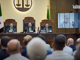 Who are the nine Assad regime officials sentenced to death in Syria?