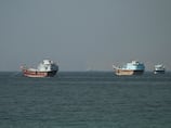 More than 100 vessels evacuated from Strait of Hormuz as Gulf of Oman attack halts wider rescue mission