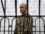 Tortured children and missing fingernails: Syrian trial hears charges against Assad general
