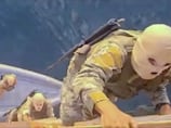 Iran's fast boat attacks intensify Strait of Hormuz confrontation