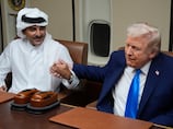 Donald Trump meets Qatar’s Emir aboard Air Force One
