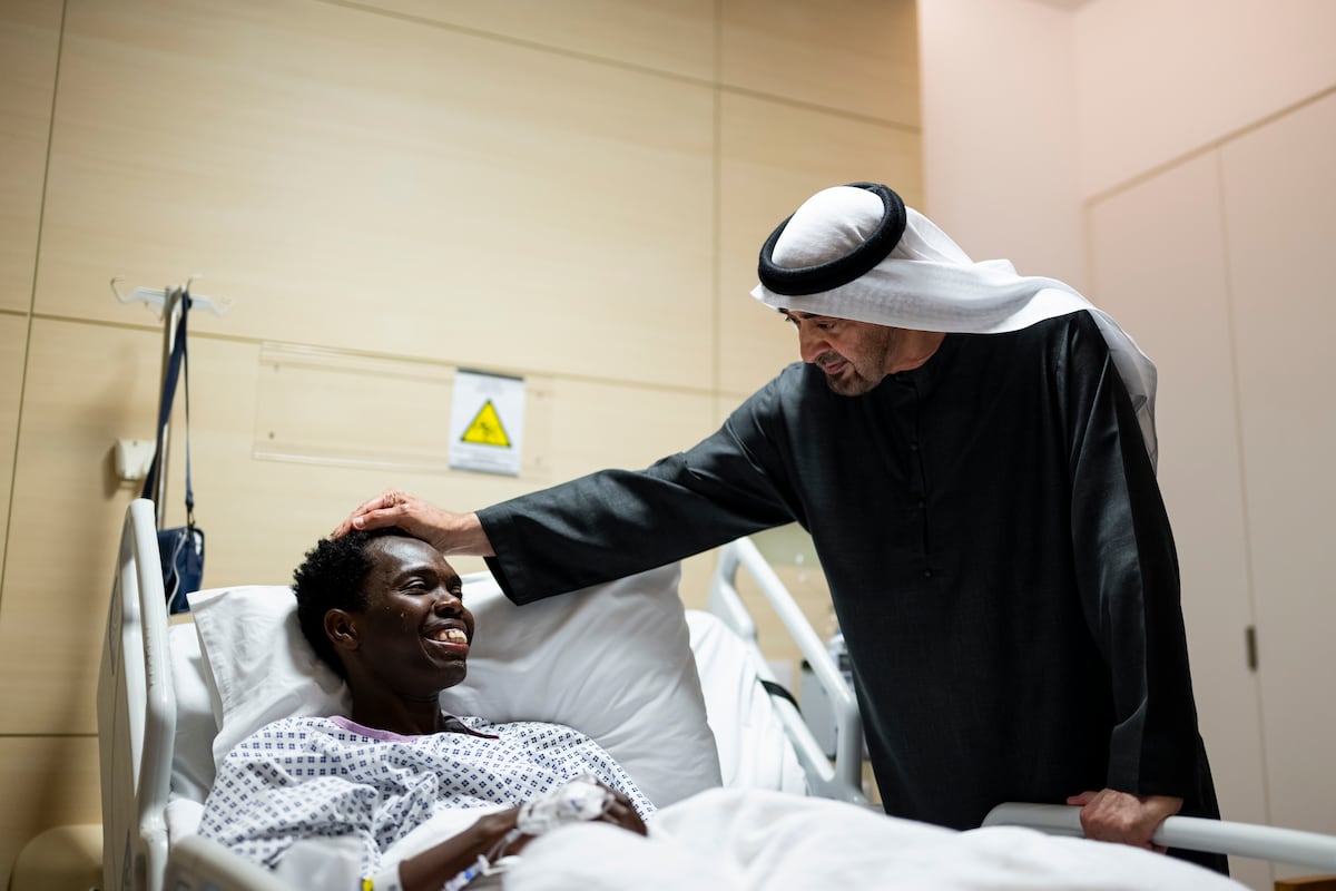 UAE President Sheikh Mohamed bin Zayed Al Nahyan visiting an injured civilian