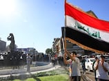 Iraqis erupt in jubilation as national football team qualifies for World Cup