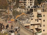 Israel demolishes apartment block in East Jerusalem