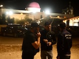 King Abdullah condemns 'terrorist attack' at Jordan church that killed eight