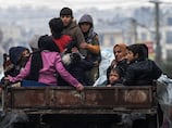 'We just want to go home now': Syrians hope for calm in Aleppo after understanding reached