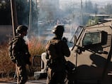 West Bank houses burn as tensions flare over deadly shooting