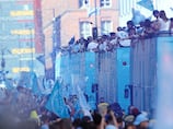 City paint Manchester blue during grand trophy parade
