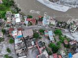 Climate change raises risk of 'catastrophic' events as Nepal-Tibet flood death toll mounts