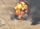 Houthi attacks on Saudi Arabia wound dozens and halt operations at energy sites