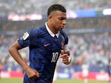 Mbappe dazzles as France outclass Iraq in stormy Philadelphia
