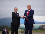 Trump says China and Russia pledged not to arm Iran