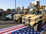 Iraq’s PM orders probe after US flag trampled by Iran-backed militias