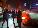 Iran hangs two arrested in anti-government protests after crowds try to halt executions