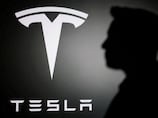 Tesla profit falls short of expectations as operating costs rise