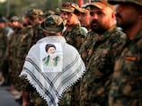Iran-aligned Iraq militia warns government of 'internal strife' if forcibly disarmed