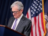 Federal Reserve cuts interest rates by 25 basis points but signals pause