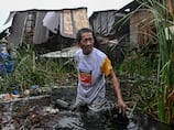 Two killed as Super Typhoon Uwan slams into Philippines