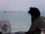 Shipping companies welcome Strait of Hormuz reopening, so long as safety is guaranteed