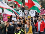Thousands protest at US embassy in London calling for end to strikes on Iran